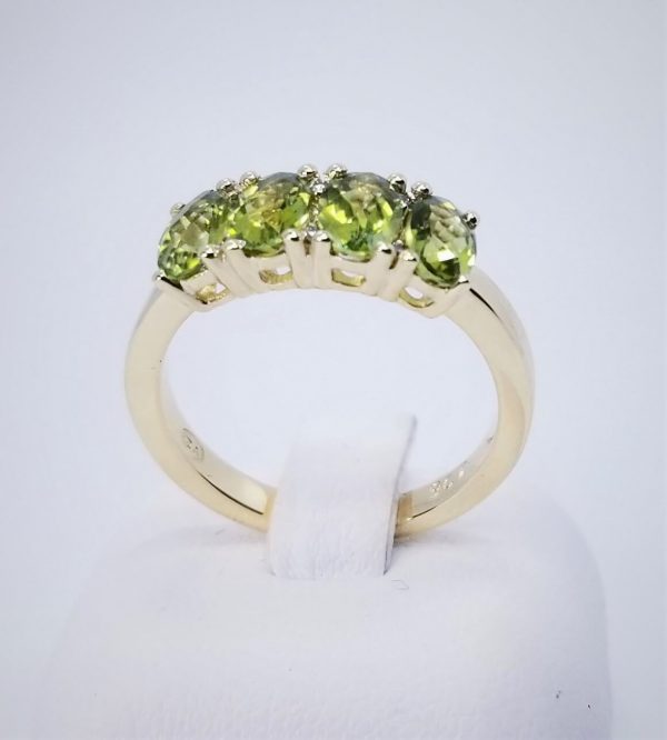 9kt Yellow Gold 4 stone Oval Peridot and Round Brilliant Cut Diamond Ring available online in Dublin