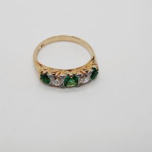 Gold East West set Oval Cut Emerald and Round Brilliant cut Diamond Vintage Inspired Ring