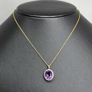 9kt Yellow Gold Pendant with Oval Cut Amethyst and Round Brilliant Cut Diamonds