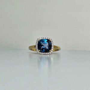 9kt Yellow Gold Halo Ring with 8x8mm Cushion Cut London Blue Topaz and 0.14ct Diamond Halo