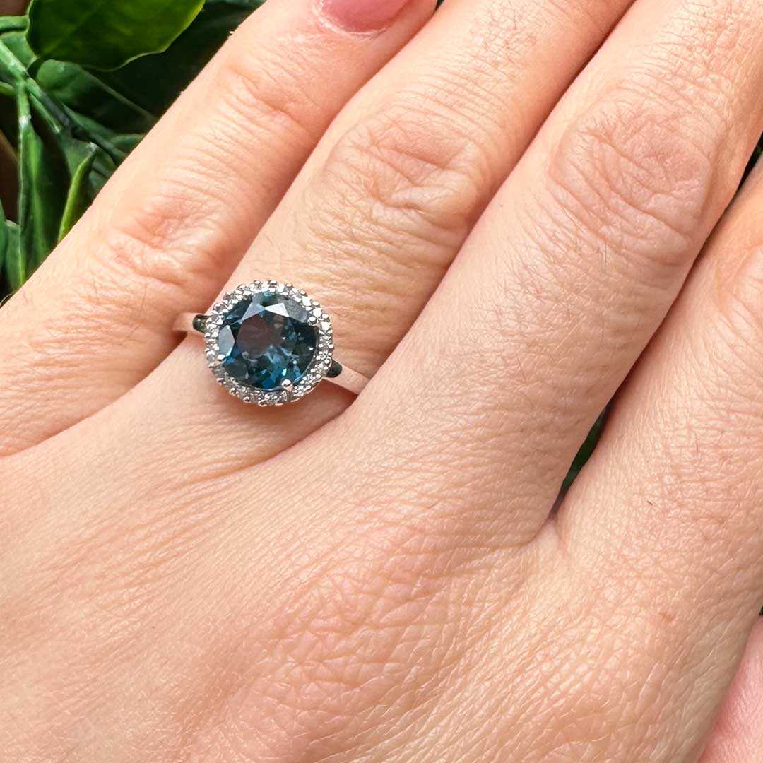 9kt White Gold Halo Ring with 8x8mm Round Cut London Blue Topaz and 0.14ct H Colour SI Clarity Round Brilliant Cut Diamond Halo