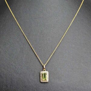9kt Yellow Gold Pendant with Emerald Cut Peridot and Diamond Halo