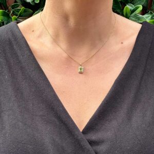 9kt Yellow Gold Pendant with Emerald Cut Peridot and Diamond Halo