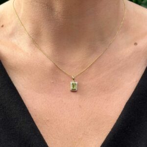 9kt Yellow Gold Pendant with Emerald Cut Peridot and Diamond Halo