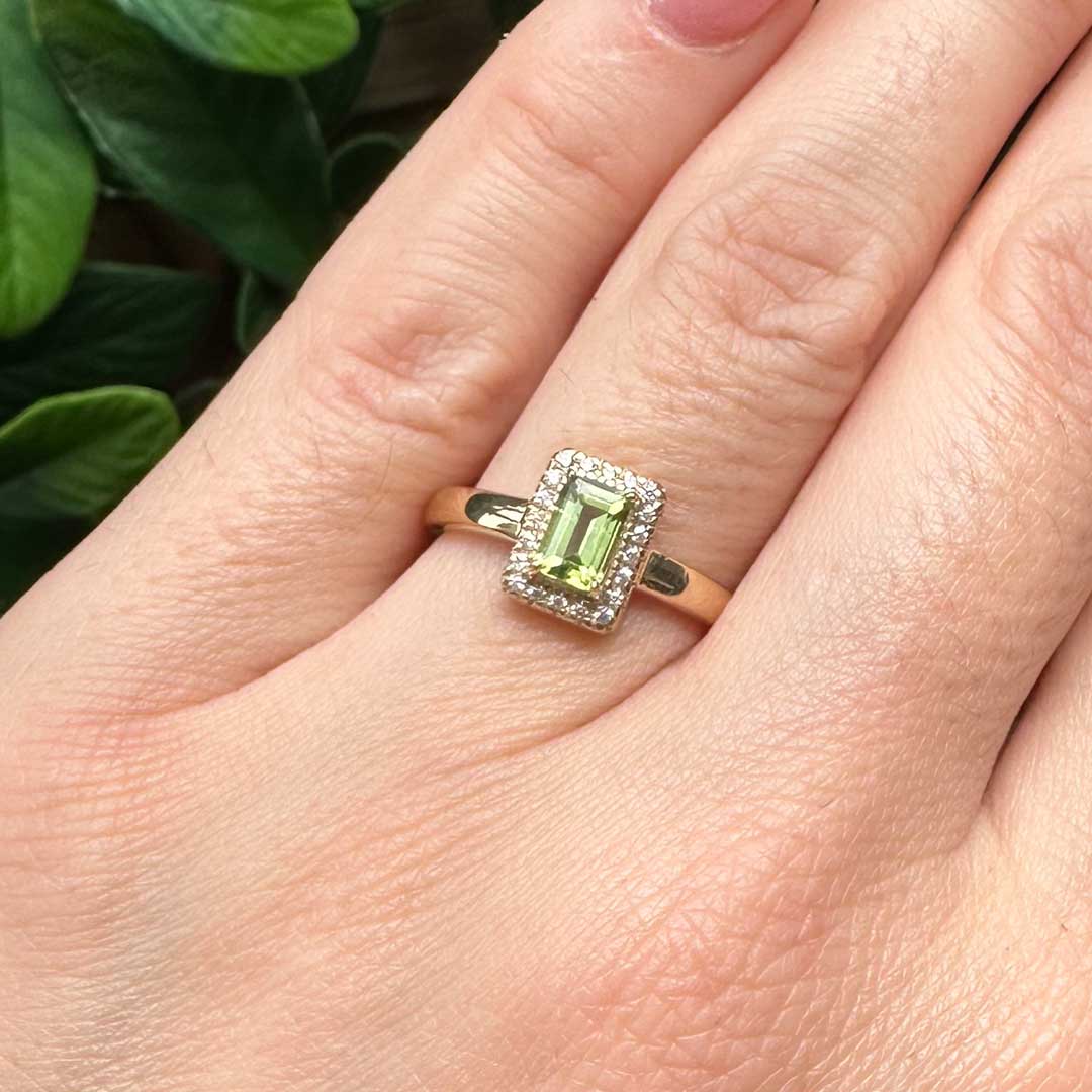 9kt Yellow Gold Ring with Emerald Cut Peridot and Diamond Halo