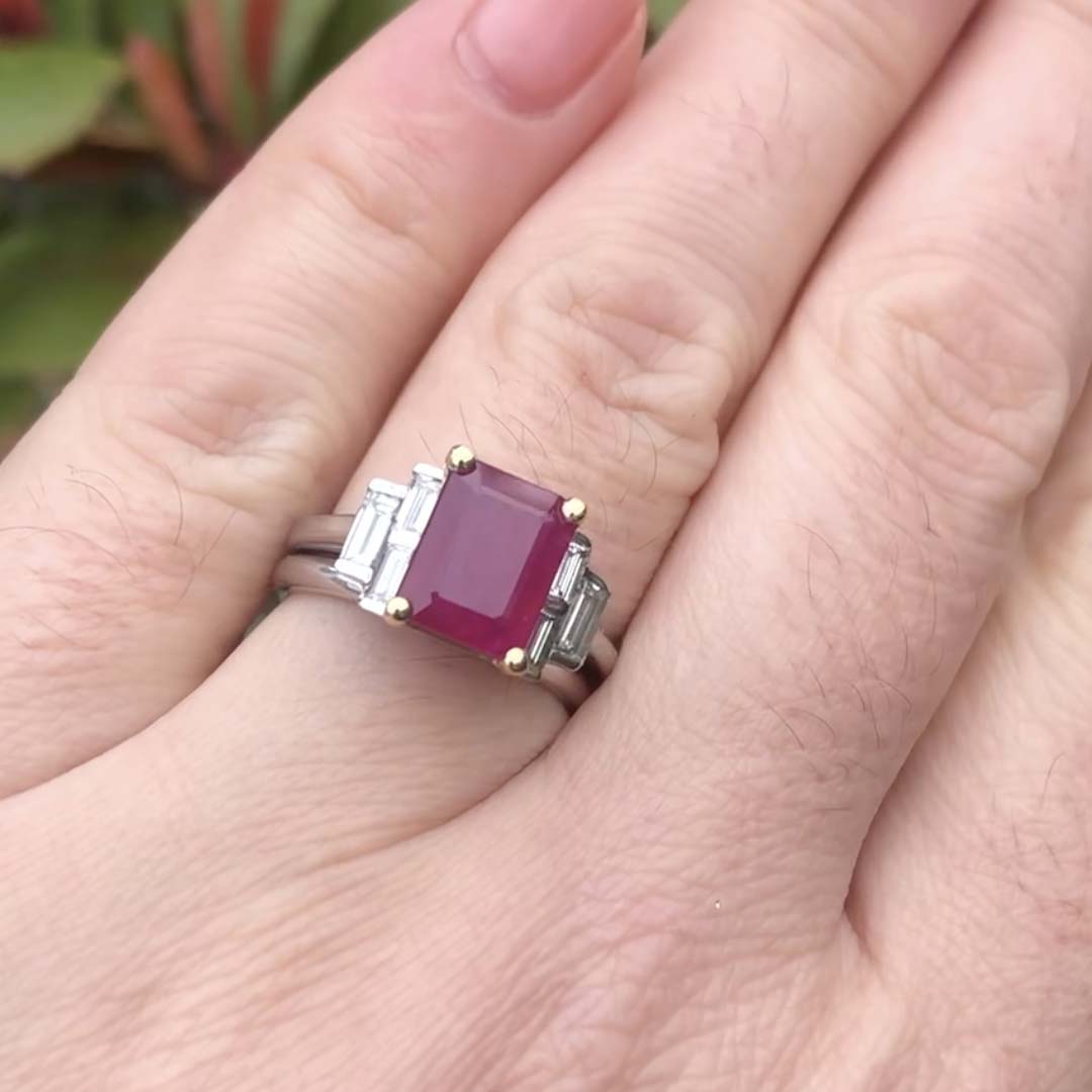 Platinum Ring with Emerald Cut Ruby and Baguette Cut Diamond Sidestones