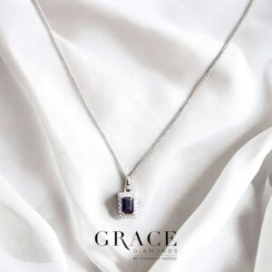 9kt White Gold Pendant with Emerald Cut Blue Sapphire and Diamond Halo
