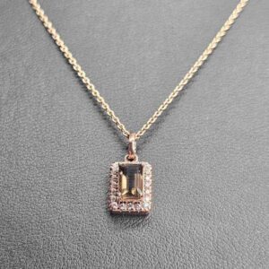 9kt Rose Gold Pendant with Emerald Cut Peridot and Diamond Halo