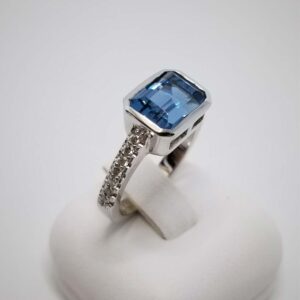 9kt White Gold Ring with East West Set London Blue Topaz and Diamond Band