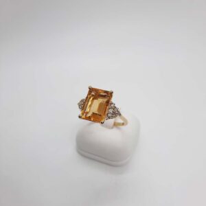 18kt Yellow Gold Ring with Emerald Cut Citrine and Trilliant Cut Diamond Sidestones