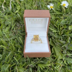 18kt Yellow Gold Ring with Emerald Cut Citrine and Trilliant Cut Diamond Sidestones