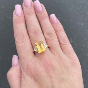 18kt Yellow Gold Ring with Emerald Cut Citrine and Trilliant Cut Diamond Sidestones