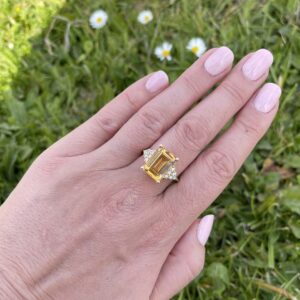 18kt Yellow Gold Ring with Emerald Cut Citrine and Trilliant Cut Diamond Sidestones