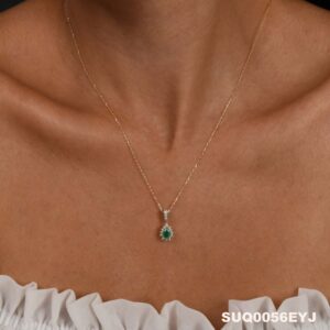 18kt Yellow Gold Pendant with Pear Cut Emerald and Diamond Halo