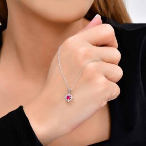 18kt White Gold Ruby Pendant with Diamond Floral Halo