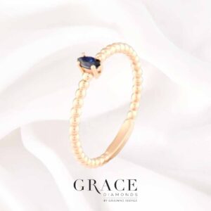 18kt Yellow Gold Beaded Band Solitaire Ring with Oval Cut Blue Sapphire