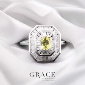 18kt White Gold Ring with 5x4mm Oval Cut Yellow Sapphire and Diamond Baguette Halo