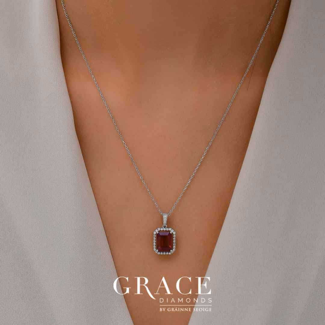 18kt White Gold Emerald Cut Ruby Pendant with Diamond Halo