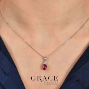 18kt White Gold Oval Cut Ruby Pendant with Diamond Accents